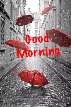 two red umbrellas floating in the air over an alleyway with words good morning