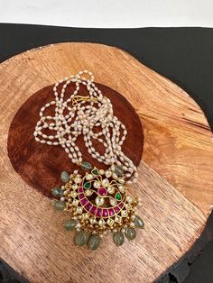 Simple Jadau Kundan Rice Pearls Necklace with matching earringsColor : GoldenSize : Necklace Length : 22 InchesStones : Red Green Jadau Kundan Rice Pearls Necklace Traditional, Rice Pearls, Kundan Necklace, Pearls Necklace, Kundan Necklaces, Social Events, Necklace Length, Indian Jewelry, Red Green