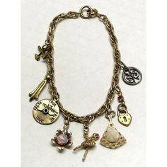 Vintage gold charm bracelet. Super cute charm bracelet well made. Hanging charms are flower with glass opal stone, Love meter with spinning arrow, ballerina, axes, charms, heart and flower charms. Super well made. JH45H. Cheap Bohemian Charm Bracelet With Lobster Clasp, Luxury Heirloom Bracelet With Vintage Charm, Gold Brass Charm Bracelet With Vintage Charm, Yellow Gold Vintage Charm Metal Charms, Vintage Yellow Gold Metal Charms, Charming Gold Charm Bracelet As Gift, Yellow Gold Vintage Metal Charms, Yellow Gold Vintage Charm, Yellow Gold Vintage Charms