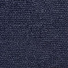 an up close shot of the dark blue textured fabric that has been woven into it