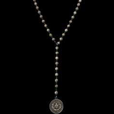 The Sacred Heart Lariat Necklace is made of faceted labradorite joined by gunmetal wire and a gunmetal clasp that allows it to be placed on any bead and worn several different ways. Known as the Sante Vierge medallion, it features the Sacred Heart on one side and the Madonna on the reverse. This medal is recast from the vintage original in Sterling Silver. It is French in origin. The Sterling Silver mark .925 is found on the edge of the medal, just below Her feet. Made in the USA in our sweet st Adjustable Silver Hand Knotted Necklace, Silver Hand Knotted Adjustable Necklace, Bohemian Silver Hand Knotted Jewelry, Silver Bohemian Jewelry, Immaculate Heart, The Madonna, Queen Of Heaven, The Sacred Heart, St Michael