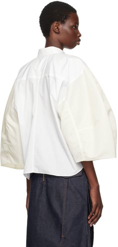 Polyester- and cotton-blend poplin and nylon twill shirt. · Paneled construction · Spread collar · Concealed button closure · Patch pocket · Shirttail hem · Zip pocket at puff sleeve · Twin pleats at back yoke · Partial plain-woven lining Supplier color: Off white Short Sleeve Poplin Blouse For Work, White Poplin Shirt For Spring, Poplin Short Sleeve Workwear Blouse, Modern Poplin Tops For Spring, Fall Workwear Poplin Tops, Poplin Blouse With Cuffed Sleeves For Work, Spring Workwear Poplin Tops, Spring Poplin Tops For Workwear, Spring Poplin Tops For Work