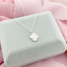 A simple and elegant sterling-silver Four Leaf Clover, a perfect lucky charm to wear during the day. The Clover Pendant is dainty, very lightweight and would be perfect for layering or as a stand-alone necklace. * D E T A I L S * * 10mm charm * Sterling Silver * Dainty Style * 3 chain lengths available (16, 18, and 20 inch) L I K E ∙ W H A T ∙ Y O U ∙ S E E ? More Clover Jewelry * https://etsy.me/2v16Q1K More Necklaces * https://etsy.me/2PEnETk More from our shop * https://etsy.me/2vasKjo Are yo Lucky Four Leaf Clover, Silver Initial Charms, Lucky Charm Necklace, Clover Jewelry, Dainty Style, Celtic Pendant, Pretty Jewelry Necklaces, Four Leaf Clover Necklace, Signature Necklace