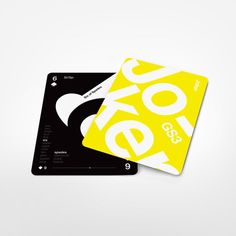 two yellow and black business cards with the word voip on them, sitting next to each other