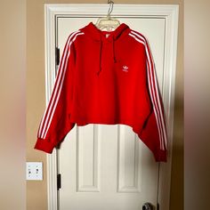 Adidas Cropped Hoodie Bought Direct From Adidas To Wear With Pants. Jacket I’m Xl Wasn’t Available So Bought The Matching Hoodie. Pants Are Too Big So Selling Pants Also. Later Found Jacket In Men’s Size But Selling Jacket Also Since Pants Are Too Big. This Scarlet Red Color Pops! Bundle & Make An Offer Red Hooded Sporty Sweater, Sporty University Red Hoodie Sweatshirt, University Red Sporty Hoodie Sweatshirt, Red Fleece Sporty Sweater, Sporty Red Hooded Top, Red Long Sleeve Sweatshirt Athleisure, Red Hooded Fleece Sweater, Red Long Sleeve Athleisure Sweatshirt, Red Adidas Sweatshirt For Sports