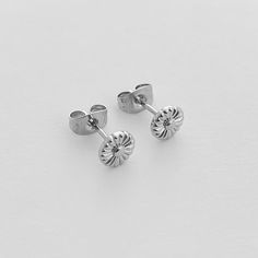 Pretty, petite, and cute as a button, our Daisy Studs have just the right amount of sparkle. Measures 6mm. Our materials make for an amazing, high quality, seamless, jewelry piece with longevity. Our earrings are plated with 18k gold, 18k rose gold, or rhodium and finished with a protective coating. A little secret we’ll keep between us: it looks way more than it costs. Daisy Studs, Cute As A Button, Delicate Jewelry, Everyday Jewelry, Chic Boutique, Jewelry Branding, 18k Rose Gold, Jewelry Care, Sales Gifts