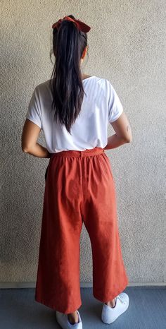 "* Super comfortable wide-leg pants, they are like hidden pajamas! * This fabric is soft like butter and it doesn't wrinkle much, so no ironing is needed, which means more time for you! * High waisted with an elastic band, for extra comfort. * Paper bag waist * You can wear them with and without the tie * Two big pockets * Lengthen or shorten up to 15cm / 6in at no extra cost, just let me know in the comments. | SIZES | Please check the measurements carefully. All fabrics are pre-washed and drie Relaxed Fit Cotton Wide-leg Culottes, Casual Culottes For Summer Daywear, High-waisted Relaxed Fit Cotton Culottes, Summer High-waisted Cotton Culottes, High-waisted Cotton Culottes For Summer, Summer High Waist Wide Leg Pants For Everyday, Cotton Culottes With Elastic Waistband, High Waist Culottes With Elastic Waistband And Relaxed Fit, High-waisted Cotton Culottes With Elastic Waistband