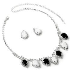 This jewelry set is stunning! It is encrusted with clear, sparkling rhinestones along a silver plate. The necklace measures approximately 13" long with a 6" long extender Chain for just the right fit. The matching Earrings measure 0.75" long and 2.0g in weight. It is perfect for weddings, proms, formals, parties, pageants, and more. It coordinates with any color or style wedding dress or formal ensemble. Silver Jeweled Cubic Zirconia Jewelry Sets, Silver Cubic Zirconia Jeweled Jewelry Sets, Teardrop Crystal Jewelry With Rhinestones, Silver Jewelry Sets With Rhinestones And Cubic Zirconia, Silver Cubic Zirconia Jewelry Sets With Rhinestones, Formal Teardrop Rhinestones Jewelry Sets, Diamond White Rhinestone Jewelry Set For Anniversary, Silver Teardrop Rhinestone Necklace, Teardrop Cubic Zirconia Jewelry Sets With Rhinestones