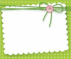 a green and white polka dot card with a pink button on the side, tied to a string