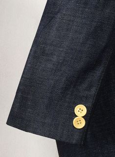 Check out our Selvedge Denim Suit - a unique blend of style and durability. This suit is crafted from 100% cotton selvedge denim, known for its rugged feel and exceptional longevity. One of the defining features of selvedge denim is the signature 'self-edge' or selvedge, a clean, tightly woven band on the edge of the denim fabric. Our suit showcases this unique detail with a distinctive white selvedge border, adding a pop of color and authenticity. This denim not only looks great but ages beauti Classic Single-breasted Denim Jacket With Notch Lapel, Classic Notch Lapel Single Breasted Denim Jacket, Classic Tailored Denim Jacket With Pockets, Classic Denim Blazer With Buttons, Classic Tailored Denim Jacket, Classic Fitted Denim Blazer, Classic Denim Blue Jacket With Welt Pockets, Fitted Denim Blue Jacket With Welt Pockets, Classic Cotton Jeans For Formal Occasions