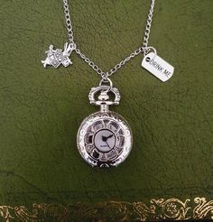 Alice in Wonderland Pocketwatch Necklace with 'Drink Me' and White Rabbit Charms Silver coloured Brand new with working battery Chain length is 80cm but I can adjust it to a smaller size upon request. Clock is 2.5cm x 2.5cm Alice In Wonderland Gifts £20, Alice In Wonderland Jewelry, Alice Halloween, Dorothy Wizard Of Oz, Rabbit Charm, Pocket Watch Necklace, Vintage Style Necklace, Bookclub Gifts, Antique Keys