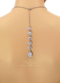 "Finish: Silver Platinum plated components Material: Top quality rhinestones, AAA Zirconia, lobster clasp. Length of Necklace: 17.5 inches and 5 3/4\" Zirconia backdrop. Length of Earrings: 1 1/4 inches from the top of the post. Quantity: Necklace + Earrings Weight: 10g + 35g Items Condition: 100% Brand New You can find this collection here: https://www.etsy.com/shop/PepeJewe?ref=listing-shop2-all-items-count&search_query=Perl You can find Zirconia jewelry here : https://www.etsy.com/shop/Pe Silver Drop Jewelry With Jewels, Elegant Adjustable Jewelry With Handset Stones, Nickel Free Crystal Jewelry For Anniversary, Nickel-free Cubic Zirconia Pendant Jewelry, Gift Jewelry With Handset Crystal Stones, Teardrop Cubic Zirconia Jewelry With Adjustable Chain, Cubic Zirconia Jewelry With Handset Stones As Gift, Silver Teardrop Jewelry For Bridesmaid Gift, Nickel-free Drop Jewelry For Weddings