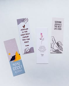 four bookmarks with different sayings on them sitting next to each other in front of a white background