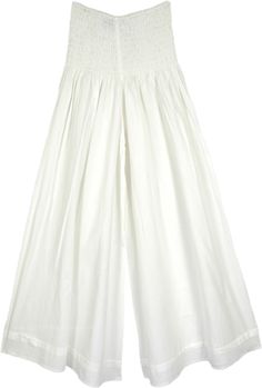 A lightweight cotton wide leg palazzo pants with a smocked waist.  These white pants feature a smocked elastic waist for a comfortable fit. #tlb #SplitSkirtsPants #vacationclothing #bohemianfashion #WideLegPants #WhitePants #VacationPants Waist-length Bottoms For Summer Daywear, Summer Cotton Wide Leg Pants With Elastic Waistband, Summer Wide Leg Cotton Pants With Elastic Waistband, Casual Bottoms With Smocked Back For Daywear, Cotton Wide Leg Pull-on Pants, Cotton Wide Leg Pull-on Pants For Vacation, Cotton Wide Leg Pants With Pull-on Style For Vacation, Solid Cotton Wide Leg Pull-on Pants, Cotton Pull-on Wide Leg Pants For Vacation