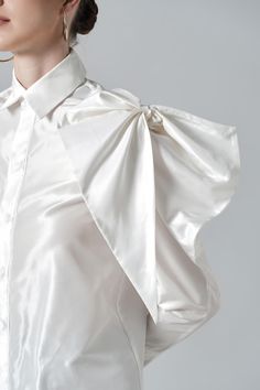 With a large size bowtie detail at the shoulder, the classic shirt now stands out like never before. High-quality silk material is selected to bring a moderate shine to the surface and created an impressive visual effect for the product. Note:*Processing time takes 7-10 working days (including 3-5 working days for manufacturing and NOT including shipping time)**Backorder Definition- The product is low in stock and in case the customer purchased successfully after out of stock, the order will nee