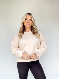 Wrapped in the luxuriously soft fabric of the Chill With Me Sweatshirt, you'll experience cool, stylish comfort like never before. This relaxed-fit staple features a rounded neckline and delicate pastel hue, making it the perfect choice for anything from brunch dates to errands to lounging. Whether you're layering or wearing solo, this ultra-stretchy, trend-savvy basic will keep you looking and feeling your best. 55% Rayon 40% Polyester 5% Spandex Hand wash cold. Spring Athleisure Long Sleeve Top With Relaxed Fit, Sporty Soft Texture Tops For Fall, Comfortable Spring Top, Spring Relaxed Fit Sweatshirt For Everyday, Crew Neck Sweater With Soft Stretch Texture, Soft Texture Stretch Crew Neck Sweater, Relaxed Fit Athleisure Tops For Fall, Cozy Tops With Ribbed Cuffs For Spring, Sporty Tops For Winter Relaxation