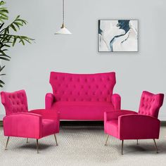 a living room filled with pink furniture next to a potted plant