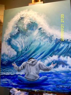 a painting of a man sitting in front of a large wave