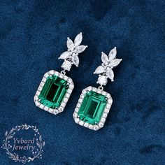 "❤Jewelry Details -Gold Type : Solid 10K Gold / Solid 14K Gold / Solid 18K Gold / Platinum (Choose One in Material Option) -Center Stone: Lab Created Emerald 7*9mm, Approximately 3.0ct*2pcs Color: Green--- 5A Clarity: VVS Cut: Emerald Cut / 3EX -Side Stone: Moissanite Moissanite Total Carat Weight: approx. 1.22ctw (a pair) Cut: Marquise Cut, Round Cut Color: D-F Clarity: VVS1 Earring Length: 25*9.5mm SKU: YE0047 ~*-*~Purchase Guarantee: - All our jewelry is handmade, and each process is refined. - 14 Day Refund Guarantee. - All our products are Free Shipping. - Free Gift Box&Packing. ~*-*~Please contact us if you need service: 1. Ring Resizing. 2. Metal Change(PT950/10k/14k/18k White/Yellow/Rose Gold). 3. Engraving ring (less than 10 letter). 4. Accept customization. We believe that our qu Luxury Green Diamond Earrings For Wedding, Luxury Emerald Diamond Earrings For Wedding, Dangle Diamond Earrings With 17 Jewels For Wedding, Emerald Earrings With Brilliant Cut For Wedding, Moissanite Drop Earrings For Wedding, Wedding Moissanite Drop Diamond Earrings, Moissanite Halo Earrings For Wedding, Wedding Moissanite Drop Earrings, Wedding Drop Earrings With 17 Jewels