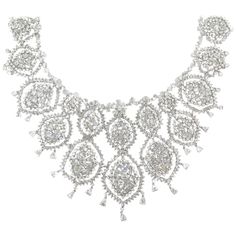 Dazzling and glamorous, this extravagant diamond statement necklace is a real eye catcher! Delicate in design yet dramatic in size, this neck piece showcases 82.01 carats of sparkling diamonds, intricately entwined in 18k white gold. Extravagant Necklace, Diamond Statement Necklace, Lottery Winning, Dramatic Necklace, Different Bracelets, Fancy Ball, Ball Jewelry, Pearl And Diamond Necklace, Diamond Heart Pendant Necklace