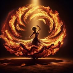 a woman in a dress is surrounded by fire with her arms spread out to the side