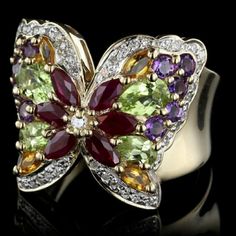 14k Yellow Gold Gem-Set And Diamond Butterfly Ring. The Ring Is Prong Set With Six Rubies Apprx. Total Wt. 1.00cts., Four Citrine, Four Peridot, Ten Amethyst And 42 Single And A Full Cut Diamond Approx. Total Wt. 23cts., Reposhing This Item I Purchased From @Joyceschoices65. Loved It, In Mint Condition Never Worn Brand New With Authentic Gem Stones, Solid 14k Gold Large Band Beautifully Made And One Of A Kind. Size 7, All Offers Considered. Questions? Leave A Comment Below Diamond Butterfly Ring, Diamond Butterfly, Butterfly Ring, Gem Stones, Womens Jewelry Rings, Crystals And Gemstones, Stone Rings, Citrine, Floral Rings