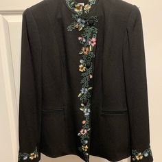 Beautiful Jacket With Embroidered Stand Up Collar, Embroidery Continues Down The Front And Repeats Around Cuff. Size 10. This One Is Special! New With Tags. Great For A Special Occasion. Measurements: Pit To Pit 18.5” Waist 17” Shoulder To Hem 26” Formal Fall Outerwear With Floral Embroidery, Formal Blazer With Floral Embroidery And Long Sleeves, Formal Long Sleeve Blazer With Floral Embroidery, Formal Floral Embroidered Outerwear For Fall, Formal Winter Outerwear With Floral Embroidery, Winter Formal Outerwear With Floral Embroidery, Winter Formal Blazer With Floral Embroidery, Fall Workwear Outerwear With Embroidered Cuffs, Fall Outerwear With Embroidered Cuffs For Work