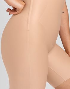 This invisible sculpting, high compression short features minimal seaming with strategically placed hidden sculpting panels for a truly seamless fit. Flexible boning hidden in the side seams prevents roll-down. An opening in the gusset makes bathroom trips a breeze. Honeylove, No-Show High-Waist Shorts for Women in Sand (Nude), Size: XS Fitted Shorts With Built-in Padding, Sculpting Smoothing Bottoms Mid-thigh Length, Compressive Beige Shapewear Mid-thigh Length, Sculpting Seamless Mid-thigh Bottoms, Sculpting Seamless Mid-thigh Length Bottoms, Beige Compressive Mid-thigh Length Shapewear, Sculpting Smoothing Mid-thigh Bottoms, Sculpting Seamless Short-length Bottoms, Compression Shapewear With Built-in Shorts And High-cut Leg