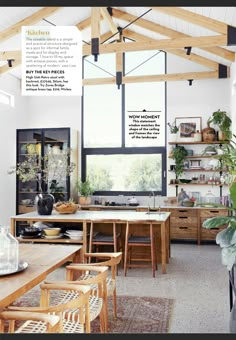 an open kitchen and dining room area with wooden tables, chairs, and shelves filled with potted plants