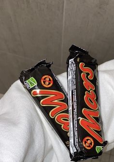 two chocolate bars sitting on top of each other