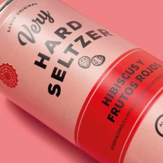 a can of beer on a pink background with the words, herbs and herbs