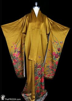 "www.TheFROCK.com www.CTMadrigal.com www.amazon.com/author/ctmadrigal Bronze silk satin kimono robe, coat, or dressing gown with flowers and butterflies populating the long blades of grass that hem the body and sleeves, front and back. Condition is excellent with only age appropriate wear. One-size-fits-most, measures about 49\" around at the ties, and 62\" long. Layaway is available. Age-appropriate wear on vintage and antique kimonos may include slight color variation or bleed on vintage and a Luxury Gold Kimono, Ceremonial Silk Kimono With Kimono Sleeves, Gown With Flowers, Gown Floral, Robes Glamour, Silk Kimono Robe, Satin Kimono, Flowers And Butterflies, Vintage Fur