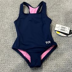 Nwt Tyr Size 2t Navy Blue Suit With Pink Liner Sleeveless Blue Bodysuit For Playwear, Blue Sleeveless Bodysuit For Playwear, Blue Fitted Swimwear For Training, Fitted Blue Bodysuit For Playwear, Blue Fitted Training Swimwear, Blue Sleeveless Playwear Bodysuit, Blue Quick-dry Swimwear For Water Sports, Tyr Swimsuit, Blue Moisture-wicking Sport Swimwear