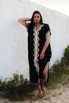 This Boho Kaftan Caftan is so cozy, it's definately idea for wearing during the weekend, or when you just want to relax at home. Although this caftan is really cozy, because the style is so elegant, it could be worn for an exotic night in, or when you want to wow your friends at your home party. Or wear it outdoors with boots, and look super bohemian! I live in London and in Marrakech. While I am in London, I always miss the exotic atmosphere of Marrakech. That's when I just bring out my comfy t V-neck Kaftan Dress For Beach, Black Short Sleeve Kaftan For Beachwear, Black Short Sleeve Beachwear Kaftan, Traditional V-neck Maxi Dress For Summer, Black Short Sleeve Kaftan For Vacation, Traditional V-neck Kimono For Summer, Bohemian Black Short Sleeve Beach Dress, Black Bohemian Beach Dress With Short Sleeves, Black Long Kaftan For Beach Season