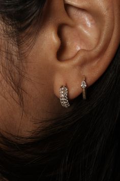 DETAILS Metal - 14k yellow or white gold Stone(s) - 0.54tcw Diamond Length - 12mm WHY WE LOVE IT Dome of diamonds. Need to bump up the sparkle of your earstack? Look no further! The Autumn earrings are dome style diamond pave huggies with major sparkle, featuring 0.54tcw of round diamonds! SHIPPING + RETURNS Learn about our Return + Exchange Policy here. LET'S CHAT! Don't see your size? Curious about something? Don't be shy, if you have any questions we would love to hear from you. Send us an em Pave Diamond Huggie Earrings, Timeless Huggie Jewelry With Pave Setting, Fine Jewelry White Topaz Diamond Earrings With Prong Setting, Dazzling Cluster Diamond Earrings With Vvs Clarity, White Gold Diamond Huggie Earrings With Vvs Clarity, Everyday White Gold Diamond Earrings, Timeless Pave Setting Huggie Jewelry, White Gold Cubic Zirconia Huggie Earrings With Pave Setting, Dazzling Huggie Earrings With Single Cut Diamonds