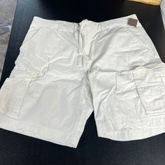 White Cargo Shorts Never Worn. Still Has Tag. Casual White Bermuda Shorts With Pockets, White Cotton Cargo Shorts With Pockets, Casual White Cargo Shorts, White Cotton Cargo Shorts With Built-in Shorts, White Cargo Shorts With Pockets, White Bermuda Bottoms With Pockets, Guy Clothing, White Cargo Shorts, Short Cargo