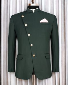 a green jacket with gold buttons on the lapel