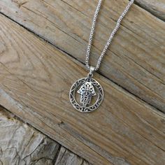 Hamsa necklace is 1 1/2" tall with bail by 1 1/16" wide at the widest spot, cast in sterling silver 925, it's on a 20" chain also in sterling silver 925 with a lobster catch...the Hamsa is a amulet shaped like a hand, it is thought to protect, it has a magical power of protection Symbolic Jewelry With Large Medallion Pendant, Bohemian Sterling Silver Pendant Charm Necklaces, Spiritual Sterling Silver Engraved Medallion Necklace, Symbolic Sterling Silver Pendant Medallion Necklace, Antique Silver Amulet Jewelry With Large Pendant, Adjustable Jewelry With Oxidized Finish For Gifts, Adjustable Oxidized Jewelry For Gifts, Adjustable Oxidized Finish Jewelry For Gifts, Adjustable White Gold Pendant Charm Necklace