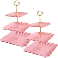 three pink paper plates with gold handles