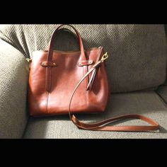 Cognac Fossil Brand Crossbody Purse. Used A Handful Of A Times. Purchased Online At Fossil (Not The Outlet). Outside Slide Pocket On The Back, Two Interior Pockets. Zips Closed. Slight Wear On Corners. Paid $120. Asking $100 But Willing To Bargain. Fossil Crossbody Bags, Fossil Handbags, Fossil Bags, Crossbody Purse, Online Purchase, Purses Crossbody, Cognac, Fossil, Crossbody Bags