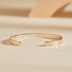 Let the bracelet do with talking with our Hammered Open Bangle. A beautiful hammered texture reveals your personalized message on the inside, wear alone or stack together with other personalized engraved bracelets to tell a special story.18K Champagne Gold Plated, 925 Sterling Silver or 18K Rose Gold PlatedSize: Approx. 2.4 x 2Width of bangle: 0.2The opening of the bangle is 1. The metal has slight flexibility, allowing the wearer to put the bangle on, wear it securely and take it off easilyHand Luxury Minimalist Engraved Bracelets, Luxury Minimalist Engraved Jewelry, Affordable Engraved Wedding Bracelets, Luxury Hammered Gold Bracelet As Gift, Luxury Etched Gold Bracelet Gift, Inspirational Engraved Bangle Bracelets, Inspirational Engraved Bangle Bracelet, Hammered Yellow Gold Bracelets Gift, Hammered Yellow Gold Bracelets As Gift