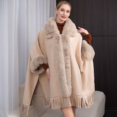 Details Size : 42.9" X 32.7" Material : 100% Acrylic Chic Shawl Cape For Fall, Chic Winter Poncho With Batwing Sleeves, Chic Cape Shawl For Fall, Chic Fall Cape Shawl, Oversized Winter Cape, Chic Batwing Sleeve Winter Poncho, Chic Winter Shawl Poncho, Oversized Shawl Poncho, One Size Cream Cape