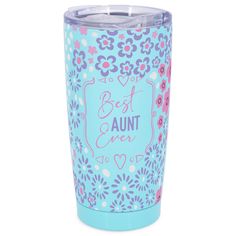 a blue and pink tumbler with flowers on it