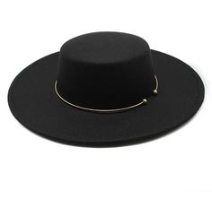 Our Timeless Fedora Hat, a classic accessory that transcends trends and embodies enduring elegance. Crafted with meticulous attention to detail, this hat exudes sophistication and style, making it a versatile addition to any wardrobe. Key Characteristics: Classic Design: The hat features a traditional fedora silhouette with a narrow brim and structured crown, evoking timeless sophistication. Enduring Elegance: Designed to transcend trends, the Timeless Fedora Hat embodies enduring elegance that never goes out of style. Versatile Wearability: Suitable for a variety of occasions, from casual outings to formal events, offering versatility and style for any setting. Comfortable Fit: Designed to provide a comfortable and secure fit, allowing wearers to feel confident and stylish all day long. U Elegant Fitted Boater Hat With Flat Crown, Elegant Adjustable Felt Hat With Flat Crown, Classic Party Hat With Flat Brim, Elegant Fitted Hat With Flat Crown, Elegant Spring Top Hat With Flat Crown, Elegant Party Hats For Fall, Elegant Fall Party Hat, Adjustable Brimmed Boater Hat For Formal Occasions, Adjustable Flat Brim Fedora For Evening