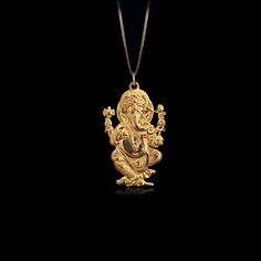 Elevate your spirit with our gold Ganesh pendant. Crafted in solid gold, this necklace beautifully captures the essence of the revered figure known for wisdom and prosperity. More than just an accessory, this pendant serves as a timeless symbol that resonates with those appreciating cultural heritage and meaningful connections. PENDANT INFORMATIONThis pendant is made of real, solid gold.• Made in USA• Material: 14k or 18k solid gold• Finish: polished• Height: 1.32" (33,5 mm) x Width: 0.8" (20 mm Ganesh Necklace, Chinese Dragon Art, Ganesh Pendant, Journey Pendant, Elephant God, Phoenix Pendant, Timeless Symbol, Gold Medallion, Solid Gold Chains