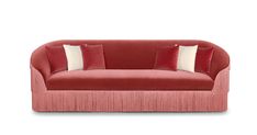 a red couch with two pillows on it