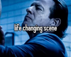 the words life changing scene are in front of a photo of a man holding his hand out