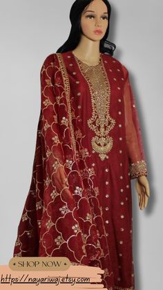 "Material: High-quality embroidered NET shirt and organza dupatta paired with silk trouser. Design: This boldly toned, net-embroidered suit is an ideal choice for your formal Eid evenings. It pairs beautifully with an elegant poly organza dupatta and classic raw silk pants. Occasion: Ideal for weddings, parties, or cultural events Includes: shirt and dupatta only Ready to wear, no hassle of stitching Comfortable and easy to move in Exquisite craftsmanship Care Instructions: Dry clean only for long-lasting beauty and durability. Note \"Please note that sizes may vary based on the specific style of the item.\" The color of the product in the photo might look slightly different in person due to factors like lighting and screen settings" Red Lawn Suit With Sheer Dupatta For Wedding, Red Lawn Suit With Intricate Embroidery For Wedding, Red Wedding Lawn Suit With Intricate Embroidery, Festive Organza Lawn Suit For Party, Designer Red Tissue Silk Sharara, Semi-stitched Organza Lawn Suit For Party, Fitted Organza Lawn Suit With Zari Work, Elegant Red Churidar With Sheer Dupatta, Elegant Red Dola Silk Churidar