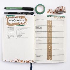 an open planner book with some writing on it