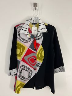 Elevate your style with our Contemporary Multi Color Blouse. The breathable fabric and abstract, contemporary design will keep you comfortable while turning heads. The red, yellow, white, and black shapes add a unique touch, while the stylish collar and sleeves complete the look. Stand out from the crowd in this must-have piece! Care: Machine wash cold Hang dry Cool iron if needed Black Shapes, Color Blouse, Multi Color Blouse, Scarf Hat, Dress With Cardigan, Sweater Skirt, Skirt Pants, Wearable Art, Red Yellow